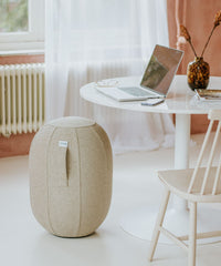 VLUV Balancekapsel (Modell KAPSUL STOV), ein luftgefüllter Balancehocker mit robustem Stoffbezug und rutschfester Unterseite.