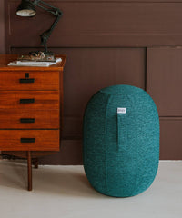 VLUV Balancekapsel (Modell KAPSUL STOV), ein luftgefüllter Balancehocker mit robustem Stoffbezug und rutschfester Unterseite.